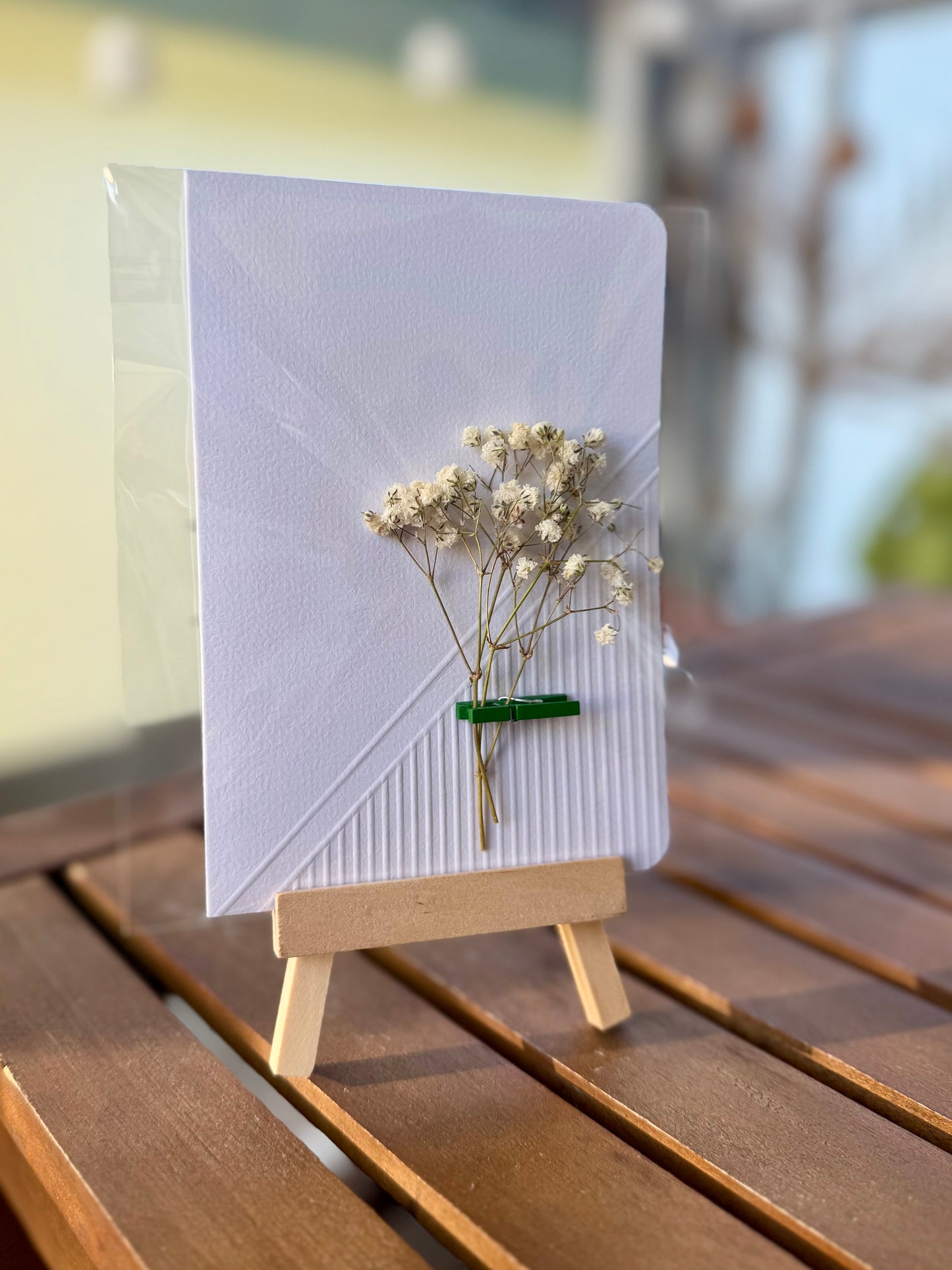 Grußkarte mit getrockneten Blumen